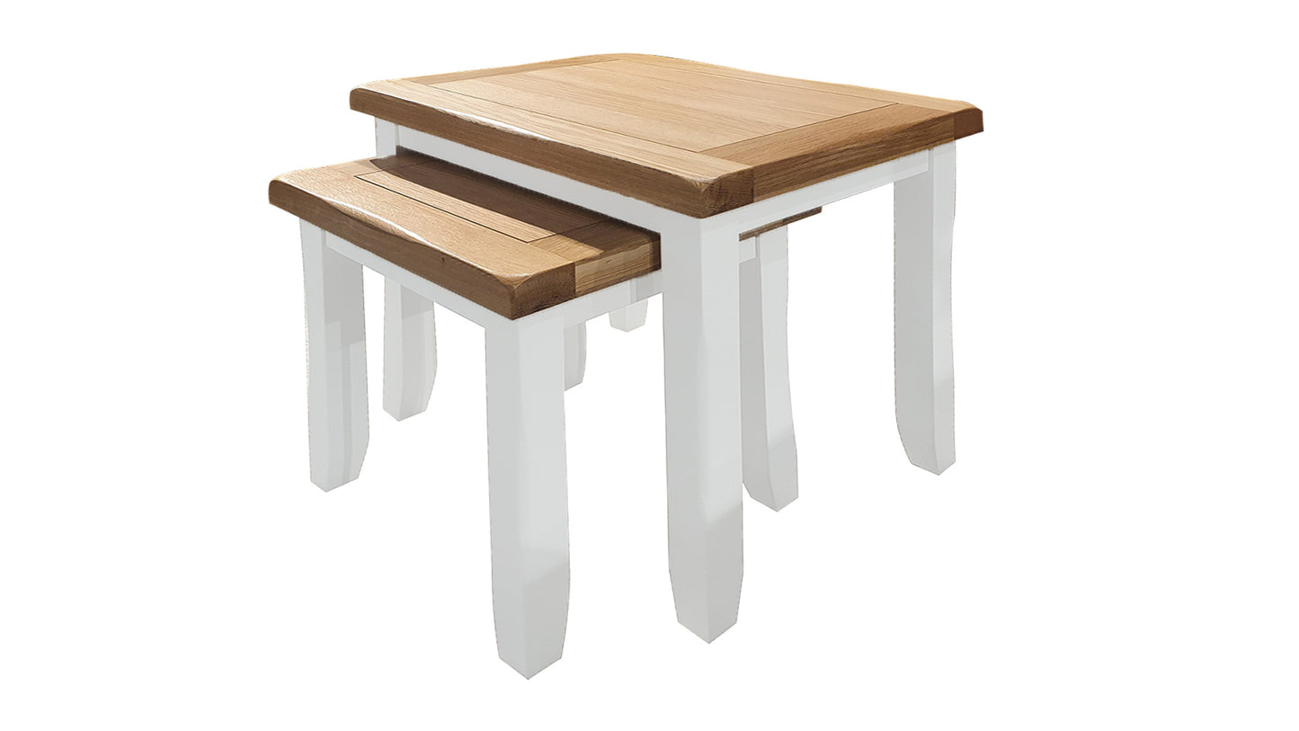 white nest of tables with oak tops